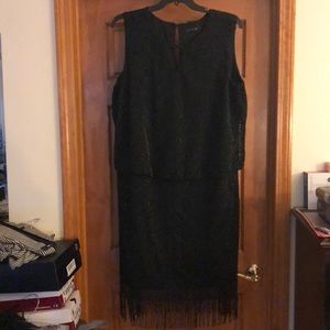 Black dress with sparkle and fringe.